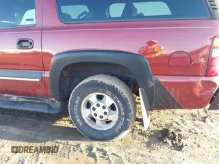 2002 Chevrolet Suburban LT z VIN 1GNFK16Z42J184265, wystawiony jako IAAI lot #41721855 z przebiegiem 227 772 mil mil oraz . Historia ofert i sprzedaży dostępna na DreamBid. Obrazek 6.