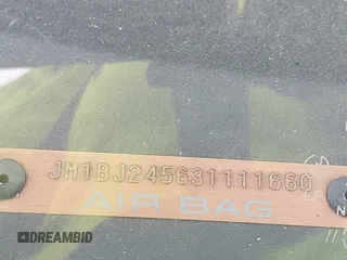 2003 Mazda Protege z VIN JM1BJ245631111660, wystawiony jako IAAI lot #42155636 z przebiegiem 243 453 mil mil oraz . Historia ofert i sprzedaży dostępna na DreamBid. Obrazek 9.