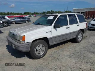 1994 Jeep Grand Cherokee Laredo with VIN 1J4GZ58S6RC295621, listed as a IAAI auction lot 42751869 with 370,230 mi miles and . Bid and sale history available at DreamBid. Image 2.