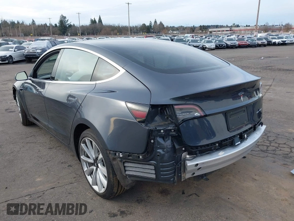 2018 Tesla Model 3 Long Range Battery with VIN 5YJ3E1EB9JF097118, listed as a IAAI auction lot 41619510 with 64,132 mi miles and . Bid and sale history available at DreamBid. Image 3.