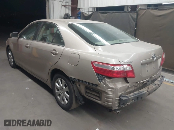2007 Toyota Camry LE z VIN 4T1BK46K27U006559, wystawiony jako IAAI lot #42250629 z przebiegiem 175 389 mil mil oraz . Historia ofert i sprzedaży dostępna na DreamBid. Obrazek 3.