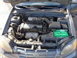 2004 Hyundai Accent GL with VIN KMHCG45C04U531177, listed as a IAAI auction lot 41526033 with 126,102 mi miles. Bid and sale history available at carsss.com. Image 10.