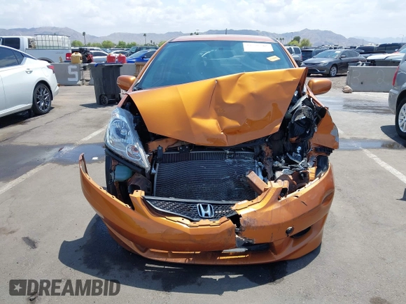 2009 Honda Fit Sport z VIN JHMGE88459S053122, wystawiony jako IAAI lot #42195267 z przebiegiem 47 349 mil mil oraz . Historia ofert i sprzedaży dostępna na DreamBid. Obrazek 6.