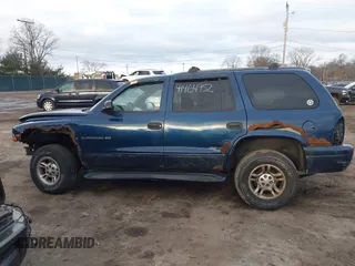2000 Dodge Durango with VIN 1B4HS28Z3YF297783, listed as a IAAI auction lot 41464952 with Not Provided miles and . Bid and sale history available at DreamBid. Image 13.