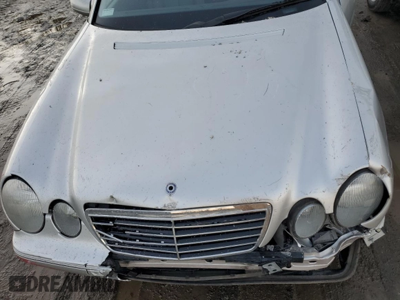 2002 Mercedes-Benz E-Class with VIN WDBJF82J32X066803, listed as a Copart auction lot 85474614 with 77,358 mi miles and Salvage Title. Bid and sale history available at carsss.com. Image 11.