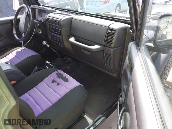 2002 Jeep Wrangler X with VIN 1J4FA39S32P738246, listed as a IAAI auction lot 42106359 with 266,993 mi miles and . Bid and sale history available at DreamBid. Image 5.