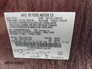 2016 Ford Taurus SEL z VIN 1FAHP2H8XGG136549, wystawiony jako IAAI lot #42338455 z przebiegiem 170 123 mil mil oraz . Historia ofert i sprzedaży dostępna na DreamBid. Obrazek 9.