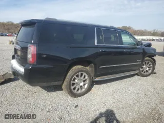 2020 GMC Yukon XL Denali with VIN 1GKS1HKJ0LR182572, listed as a Copart auction lot 80741994 with 107,195 mi miles and Salvage Title. Bid and sale history available at carsss.com. Image 3.