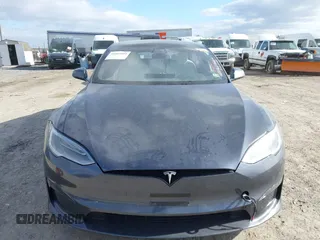 2021 Tesla Model S Plaid with VIN 5YJSA1E60MF455768, listed as a IAAI auction lot 41603504 with 27,398 mi miles. Bid and sale history available at carsss.com. Image 12.