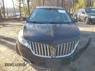 2013 Lincoln MKX with VIN 2LMDJ6JK8DBL60753, listed as a IAAI auction lot 41760954 with 121,714 mi miles. Bid and sale history available at carsss.com. Image 12.