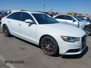 2014 Audi A6 Premium Plus z VIN WAUGFAFC6EN054589, wystawiony jako IAAI lot #42308820 z przebiegiem 134 566 mil mil oraz . Historia ofert i sprzedaży dostępna na DreamBid. Obrazek 1.