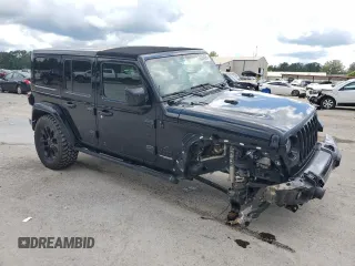 2020 Jeep Wrangler Unlimited Sahara High Altitude with VIN 1C4HJXEG1LW324669, listed as a Copart auction lot 56554095 with 42,098 mi miles and Salvage title. Bid and sale history available at DreamBid. Image 4.