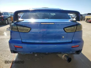 2015 Mitsubishi Lancer Evolution GSR with VIN JA32W8FV6FU006930, listed as a Copart auction lot 84628474 with 116,819 mi miles and Salvage Title. Bid and sale history available at carsss.com. Image 6.