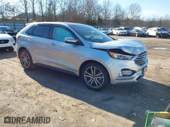 2019 Ford Edge Titanium z VIN 2FMPK3K98KBC68569, wystawiony jako IAAI lot #41209347 z przebiegiem 75 519 mil mil oraz . Historia ofert i sprzedaży dostępna na DreamBid. Obrazek 1.