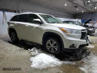 2014 Toyota Highlander XLE with VIN 5TDJKRFHXES031731, listed as a Copart auction lot 45464715 with 140,699 mi miles and Salvage Title. Bid and sale history available at carsss.com. Image 4.
