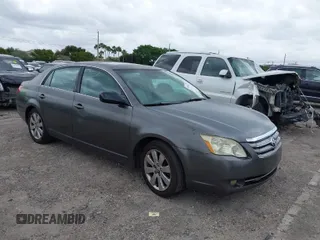 2007 Toyota Avalon XL with VIN 4T1BK36B77U213734, listed as a IAAI auction lot 41956181 with 223,857 mi miles. Bid and sale history available at carsss.com. Image 1.