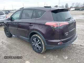 2016 Toyota RAV4 LE with VIN 2T3ZFREV0GW312324, listed as a IAAI auction lot 41470584 with 103,371 mi miles. Bid and sale history available at carsss.com. Image 3.