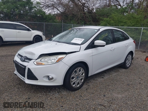 2012 Ford Focus SE with VIN 1FAHP3F21CL201889, listed as a IAAI auction lot 42070260 with 126,650 mi miles. Bid and sale history available at carsss.com. Image 19.