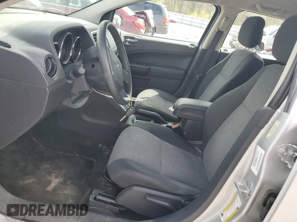 2012 Dodge Caliber SXT with VIN 1C3CDWDA2CD535730, listed as a Copart auction lot 55927895 with 67,391 mi miles and Clean Title. Bid and sale history available at DreamBid. Image 7.