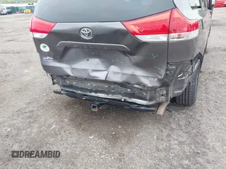 2014 Toyota Sienna XLE with VIN 5TDYK3DC0ES436502, listed as a IAAI auction lot 42180990 with 154,839 mi miles and . Bid and sale history available at DreamBid. Image 19.