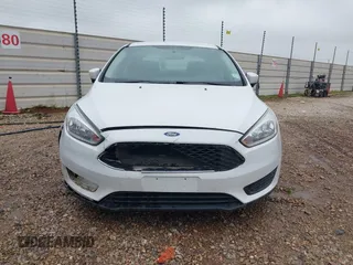 2018 Ford Focus SE z VIN 1FADP3F23JL225333, wystawiony jako IAAI lot #41758445 z przebiegiem 133 307 mil mil oraz . Historia ofert i sprzedaży dostępna na DreamBid. Obrazek 12.