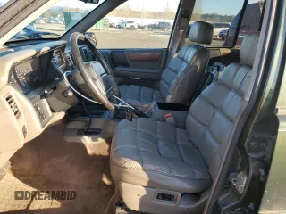 1995 Jeep Grand Cherokee Limited with VIN 1J4GZ78S7SC613568, listed as a Copart auction lot 83365584 with 184,099 mi miles and Salvage Title. Bid and sale history available at carsss.com. Image 7.