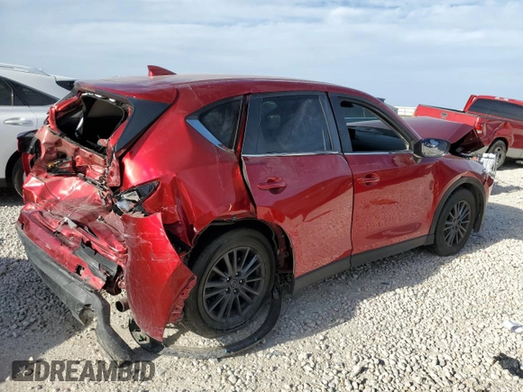 2021 Mazda CX-5 Touring with VIN JM3KFACM9M0391125, listed as a Copart auction lot 48804565 with 45,669 mi miles and Salvage Title. Bid and sale history available at carsss.com. Image 3.