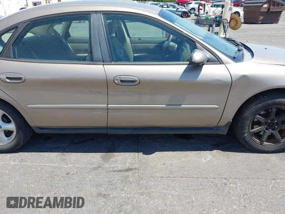 2002 Ford Taurus SE Standard with VIN 1FAFP53U62G142287, listed as a IAAI auction lot 42653173 with 58,388 mi miles and . Bid and sale history available at DreamBid. Image 6.