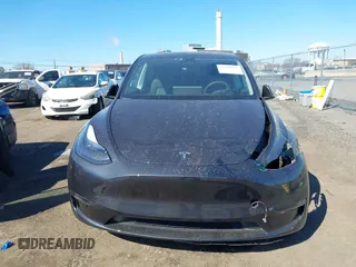 2024 Tesla Model Y Long Range with VIN 7SAYGDEE4RF149457, listed as a IAAI auction lot 41700922 with Not Provided miles. Bid and sale history available at carsss.com. Image 12.