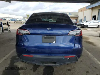 2024 Tesla Model Y Long Range with VIN 7SAYGDEE6RF025366, listed as a Copart auction lot 49328055 with 10,319 mi miles and Salvage Title. Bid and sale history available at DreamBid. Image 6.