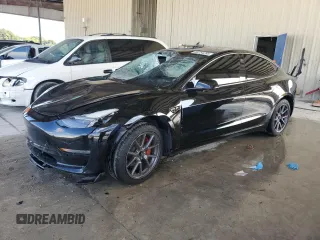 2021 Tesla Model 3 Standard Range Plus with VIN 5YJ3E1EA2MF048564, listed as a Copart auction lot 88754285 with 57,894 mi miles and Non Repairable. Bid and sale history available at DreamBid. Image 1.