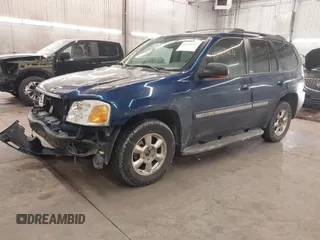 2002 GMC Envoy SLT with VIN 1GKDT13S022388743, listed as a IAAI auction lot 41338364 with 206,179 mi miles. Bid and sale history available at carsss.com. Image 2.