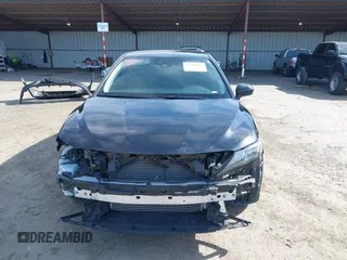 2021 Toyota Camry SE Nightshade with VIN 4T1G11AK3MU413008, listed as a IAAI auction lot 41960358 with 86,104 mi miles and . Bid and sale history available at carsss.com. Image 13.