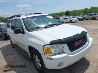 2003 GMC Envoy XL SLE with VIN 1GKES16S136153880, listed as a IAAI auction lot 42009798 with 289,208 mi miles. Bid and sale history available at carsss.com. Image 1.