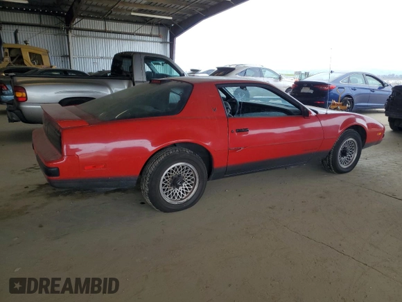 1986 Pontiac Firebird with VIN 1G2FX87S7GL202276, listed as a Copart auction lot 46745175 with 32,777 mi miles and Clean title. Bid and sale history available at DreamBid. Image 3.