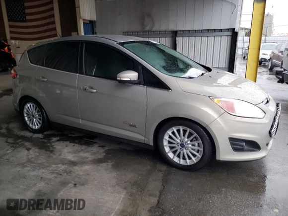 2015 Ford C-Max Energi SEL with VIN 1FADP5CU5FL112752, listed as a Copart auction lot 41140014 with 129,824 mi miles. Bid and sale history available at carsss.com. Image 4.