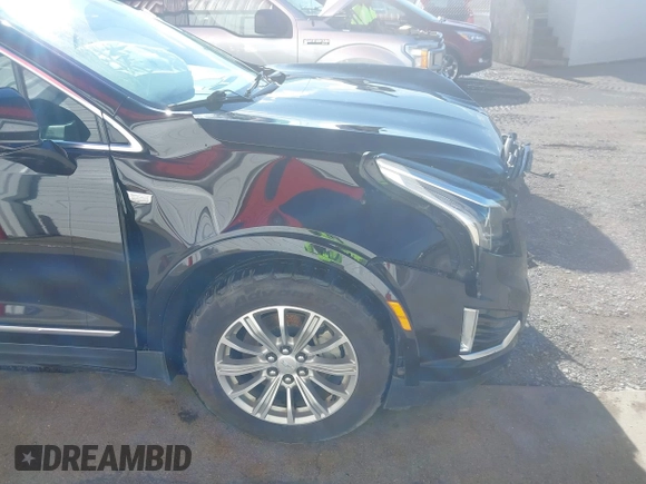 2017 Cadillac XT5 Luxury FWD with VIN 1GYKNBRS5HZ164209, listed as a IAAI auction lot 41213572 with 144,039 mi miles. Bid and sale history available at carsss.com. Image 17.