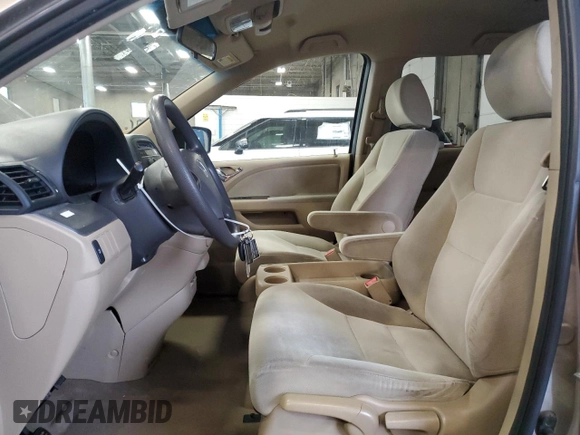 2009 Honda Odyssey LX with VIN 5FNRL38259B018546, listed as a Copart auction lot 62142015 with 162,459 mi miles and Salvage title. Bid and sale history available at DreamBid. Image 7.