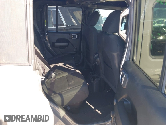 2021 Jeep Gladiator Willys with VIN 1C6HJTAG4ML517715, listed as a IAAI auction lot 41436634 with 21,187 mi miles and . Bid and sale history available at DreamBid. Image 8.
