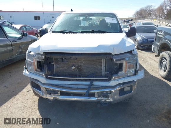 2020 Ford F-150 XL z VIN 1FTFW1E57LKE66911, wystawiony jako IAAI lot #41795867 z przebiegiem 133 390 mil mil oraz . Historia ofert i sprzedaży dostępna na DreamBid. Obrazek 6.