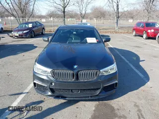 2018 BMW 5 Series M550i xDrive with VIN WBAJB9C55JB049529, listed as a IAAI auction lot 41241917 with 116,265 mi miles and . Bid and sale history available at carsss.com. Image 12.