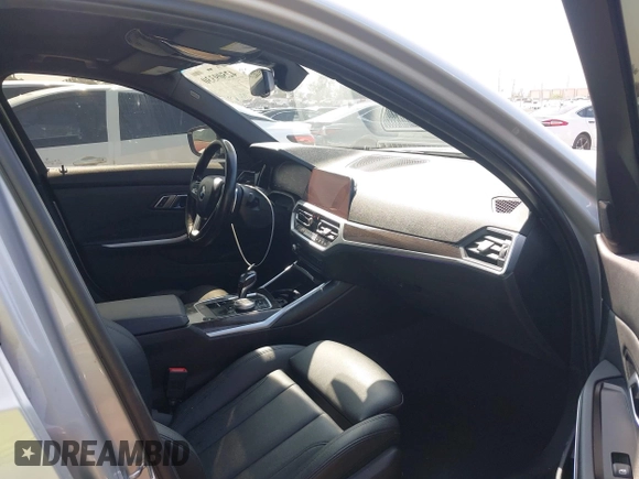 2019 BMW 3 Series 330i with VIN WBA5R1C50KAK12383, listed as a IAAI auction lot 42509330 with 78,092 mi miles and . Bid and sale history available at DreamBid. Image 5.