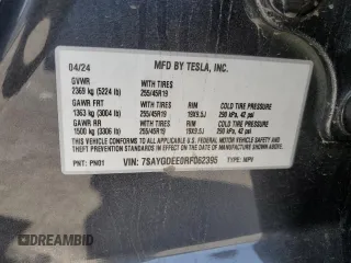 2024 Tesla Model Y Long Range z VIN 7SAYGDEE0RF062395, wystawiony jako Copart lot #55071185 z przebiegiem 42 747 mil mil oraz Szkoda całkowita • Salvage title. Historia ofert i sprzedaży dostępna na DreamBid. Obrazek 13.