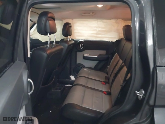 2010 Dodge Nitro SXT with VIN 1D4PU5GK0AW126478, listed as a IAAI auction lot 41362674 with 171,704 mi miles. Bid and sale history available at carsss.com. Image 8.