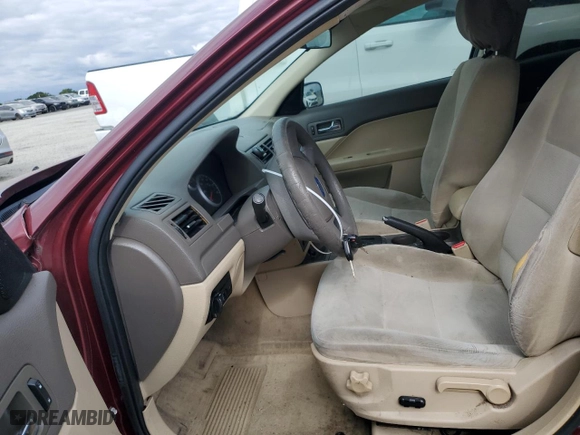 2007 Ford Fusion SE with VIN 3FAHP07Z97R129115, listed as a Copart auction lot 54450255 with 197,928 mi miles and Salvage Title. Bid and sale history available at carsss.com. Image 7.
