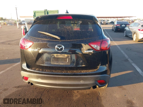 2016 Mazda CX-5 Touring with VIN JM3KE2CY5G0704574, listed as a IAAI auction lot 41033546 with 133,502 mi miles. Bid and sale history available at carsss.com. Image 16.