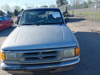 1996 Ford Ranger XL with VIN 1FTCR10A8TTA22056, listed as a IAAI auction lot 42062984 with 215,030 mi miles and . Bid and sale history available at DreamBid. Image 12.