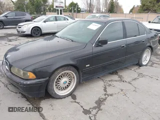 2001 BMW 5 Series 525iA with VIN WBADT43451GX20026, listed as a IAAI auction lot 41490075 with 141,700 mi miles. Bid and sale history available at carsss.com. Image 2.