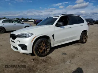 2015 BMW X5 M z VIN 5YMKT6C51F0C89029, wystawiony jako Copart lot #40456604 z przebiegiem 93 203 mil mil oraz . Historia ofert i sprzedaży dostępna na DreamBid. Obrazek 1.