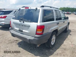 2004 Jeep Grand Cherokee Laredo with VIN 1J4GX48N04C435603, listed as a IAAI auction lot 42274197 with 256,163 mi miles and . Bid and sale history available at DreamBid. Image 4.